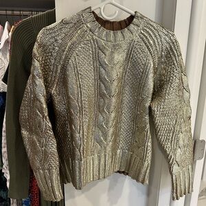 Shiny gold BR sweater size XS.